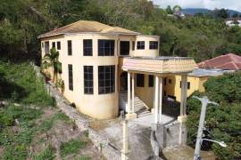 4 Bedrooms 4 Bathrooms, House for Sale in Kingston 9