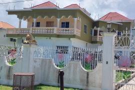 6 Bedrooms 5 Bathrooms, House for Sale in Morant Bay