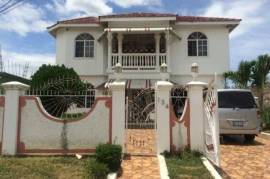 6 Bedrooms 4 Bathrooms, House for Sale in May Pen