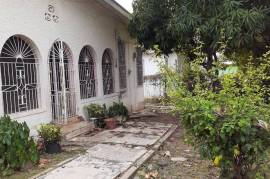 4 Bedrooms 3 Bathrooms, House for Sale in May Pen